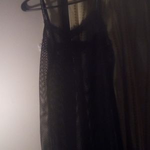 Lace vest on any shirt or skirt